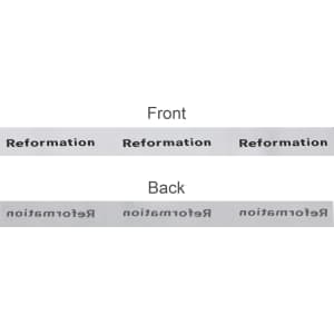 A ribbon in satin polyester, featuring repeated text in black on a white background. It has a front and back design.
