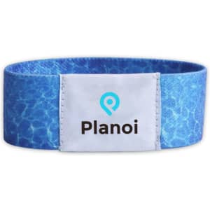 A blue stretchy wristband featuring a logo. It has a smooth texture and is designed for events.