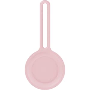 A pink Air Tag protective case with a loop for attachment. It features a smooth, rounded design.
