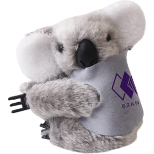 A grey koala plush toy with a pouch and a branding logo, featuring soft fabric and round ears.