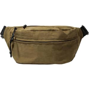 A large bum bag in a khaki colour, featuring one zippered compartment and an adjustable strap.