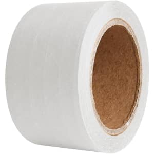 A roll of self-adhesive reinforced kraft paper tape in a translucent finish with a cardboard core.