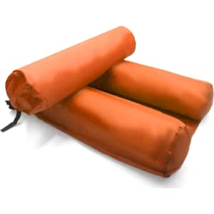 An inflatable floating chair in vibrant orange, featuring two sections for reclining and a black strap for securing.