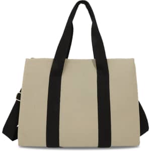 A beige canvas grocery shopping bag with black straps and a detachable shoulder strap. It features a logo.