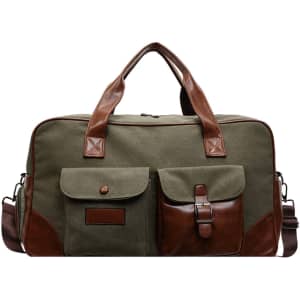 A vintage canvas duffle bag in green with brown leather accents and two front pockets. Features a logo.
