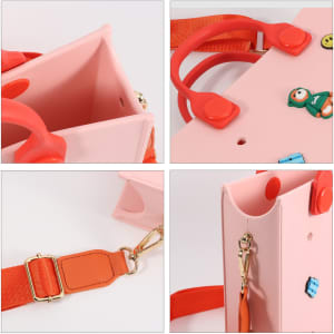 A pink EVA tote bag with red handles and an adjustable orange strap, featuring small decorative elements.