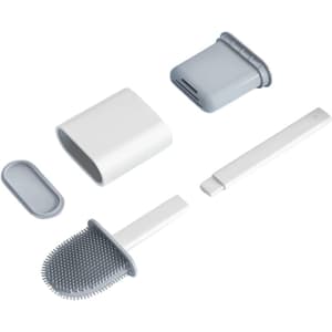 A silicone toilet brush set in white and grey, featuring multiple components including a handle and storage holder.