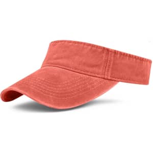 A washed sun visor in a coral hue with a wide brim and an adjustable strap. Features a logo.