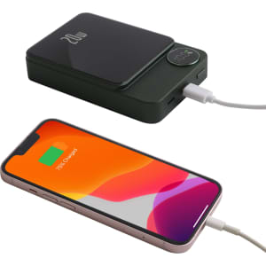 A green 10000mAh magnetic wireless power bank with a smartphone connected via cable. It features a small display and logo.