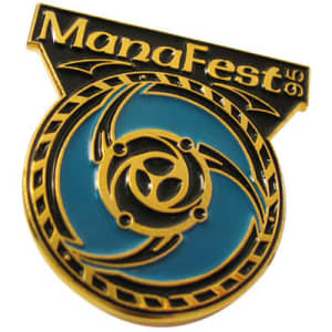A round, embossed soft enamel pin featuring a blue and gold design with a logo at the top.
