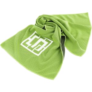 A green cooling towel with a logo, featuring a textured surface and lightweight design for outdoor activities.