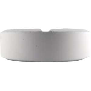 A round white tablet-shaped stress reliever with a smooth surface and a slight indentation.