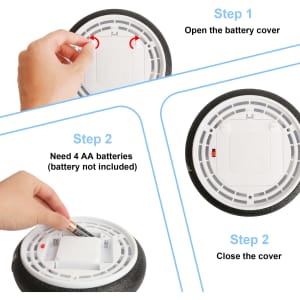 A hover soccer ball with a black outer ring and a white centre, showing battery installation steps and a hand inserting batteries.