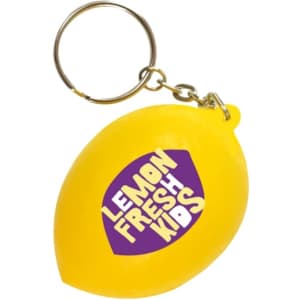 A yellow keyring shaped like a lemon, featuring a logo and attached to a metal chain.
