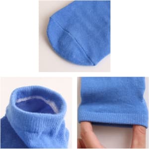 Low cut gripper socks in a vibrant blue colour, featuring a soft texture and a logo.