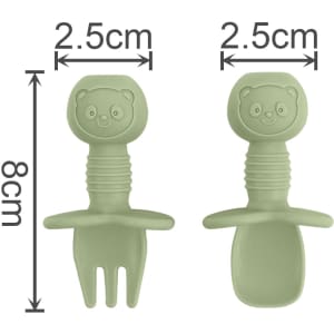 A set of green silicone cutlery for kids, featuring a bear-shaped handle with a fork and spoon.
