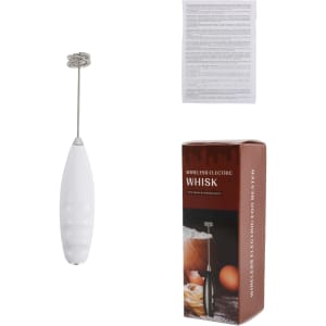 A white milk frother with a whisk attachment, beside its packaging and an instruction manual.