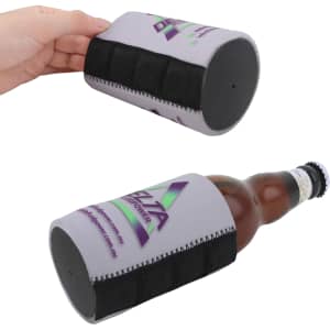 A grey stubby holder with black accents, featuring branding, designed to fit a drink bottle securely.