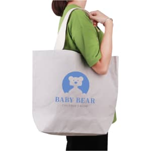 A large, washable grey kraft paper bag with a cotton handle, featuring a logo on the front.