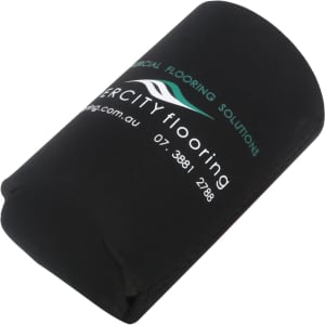 A foldable stubby holder in black with a logo, featuring a cylindrical shape and soft fabric.