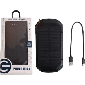 A black and green outdoor solar wireless power bank with a USB cable and packaging. It features a logo on the box.