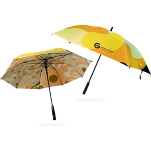 Two full colour golf umbrellas featuring vibrant patterns in yellow, orange, and beige, with one displaying a logo.