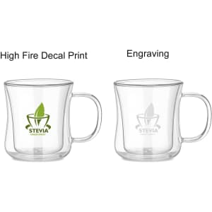 A double wall glass mug with a transparent design, featuring a handle and a logo.