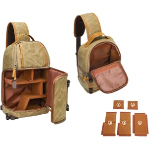 A waxed canvas camera sling bag in olive green with brown accents, featuring adjustable compartments and a branded logo.