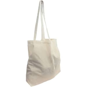 A beige calico tote bag with long handles and a gusset, featuring a subtle logo.