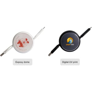 A retractable portable charging cable in white and black, featuring two USB connectors and distinct branding on each.