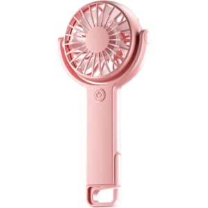 A handheld fan in soft pink with a round grille and adjustable angle. It features a power button and a loop for carrying.