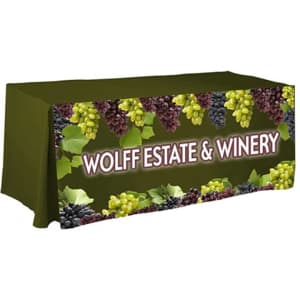 A green four-sided pleated tablecloth featuring a grapevine design and a logo.