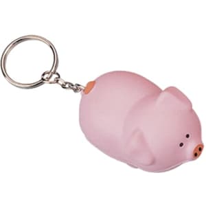 A pink pig-shaped stress reliever attached to a metal keyring. The item has a smooth texture and features a keychain.