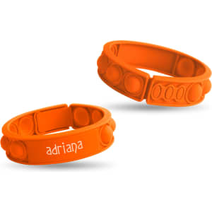 An orange silicone wristband featuring bubble-like nodes for tactile fun, with an additional band alongside it.