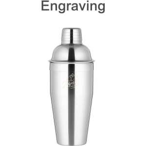 A stainless steel cocktail shaker with a polished silver finish and an engraved logo.