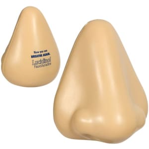 A beige stress reliever in the shape of a nose, featuring a logo on one side.