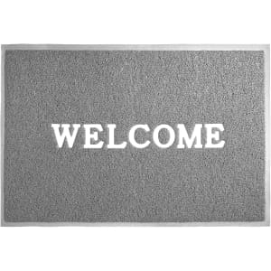 A grey debossed mat featuring a textured surface and a central logo, designed for office and business use.