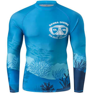 A long-sleeved rashie in various shades of blue, featuring a scuba diving design and a logo on the front.