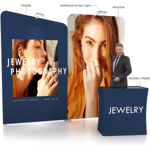 Inclined portable exhibit display wall featuring vibrant images and a dark blue colour scheme, includes a branding element and an arm light.