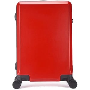 A red wheeled suitcase features a glossy finish and is equipped with dual wheels for easy mobility.