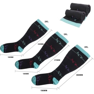 Three pairs of plus-size compression socks in black with colourful designs, accompanied by a folded pair at the top.