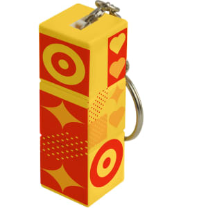 A custom square cube with keyrings, featuring vibrant yellow and red designs, and a keyring attached.