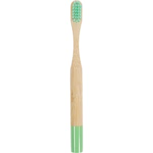A bamboo toothbrush with a small round handle featuring a mint green bottom and soft bristles.