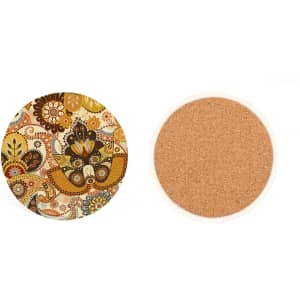 A round ceramic coaster with a colourful paisley pattern on one side and a cork base on the other.