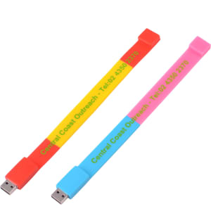 A colourful sectional wristband flash drive in red, yellow, pink, and blue, featuring a logo.