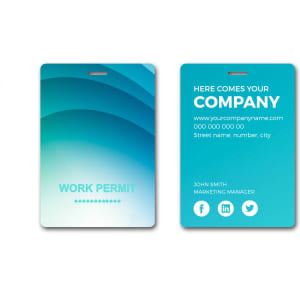 A small, uniquely printed name tag in blue and green with a smooth, wavy design, featuring a logo and placeholder information.