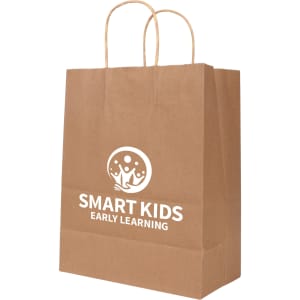 A brown kraft paper bag with twisted handles and a circular logo featuring a design, measuring 260x330x120mm.