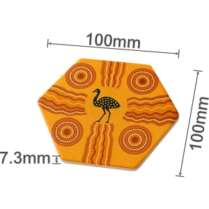 A hexagon ceramic coaster in orange and yellow featuring Aboriginal designs and a black bird silhouette.