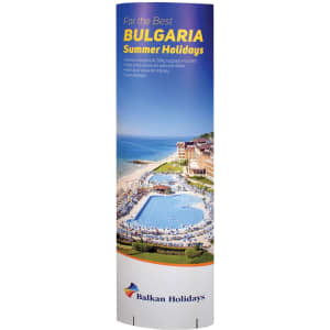 A tall, cylindrical cardboard display featuring a beach resort scene with blue and white colours and a logo at the bottom.