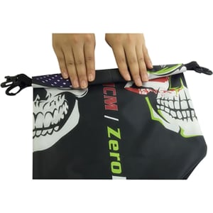 A dry bag featuring a full colour design with skull graphics, equipped with a PVC window and secure closure.